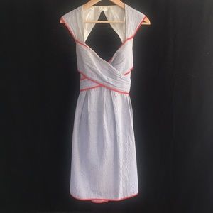 Blue and white striped dress with red trim